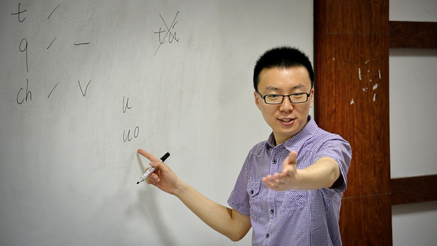 Chinese instructor looks for the proper pronunciation during class