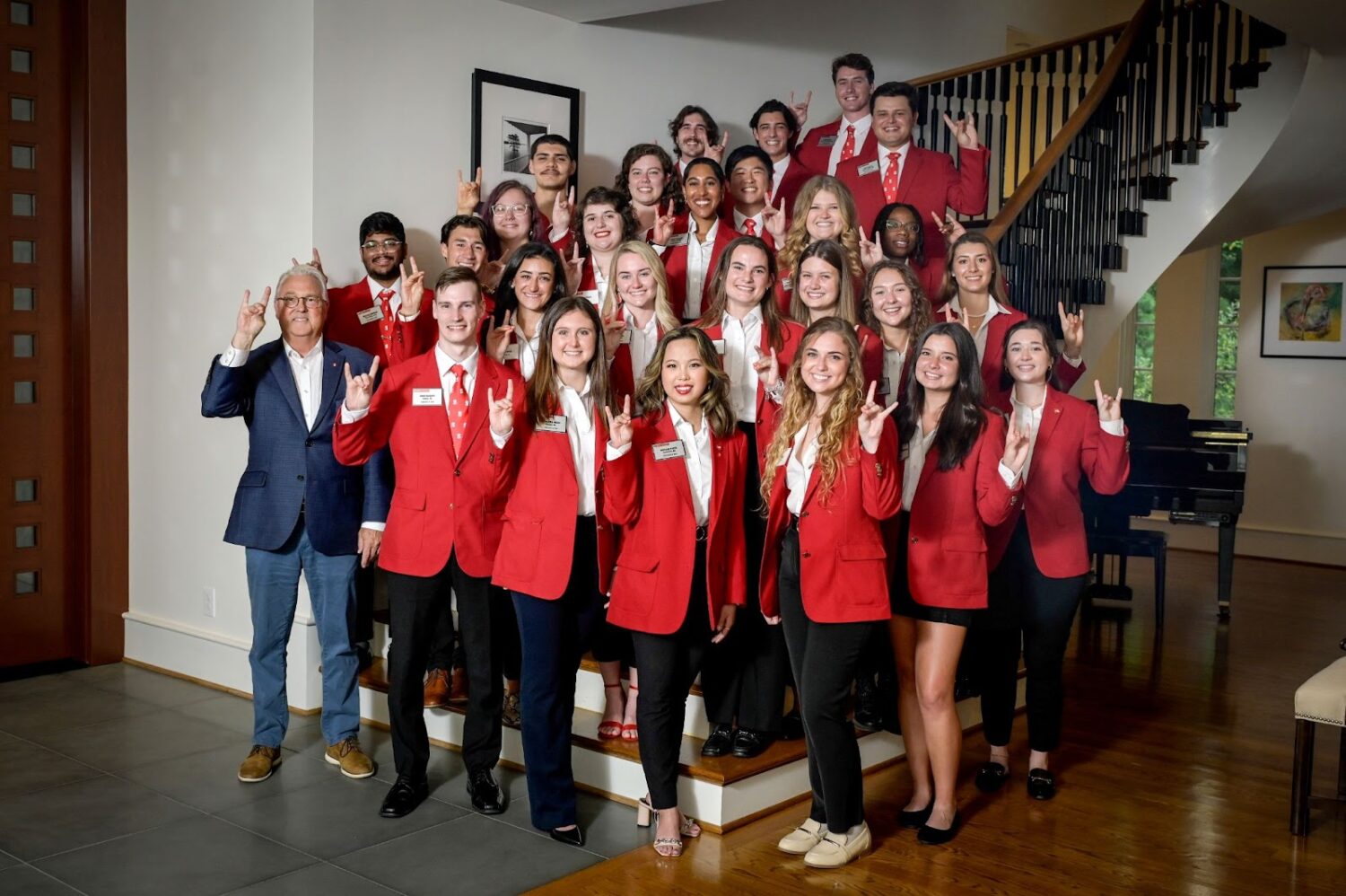 Chancellors' aides posing with Chancellor Woodson.