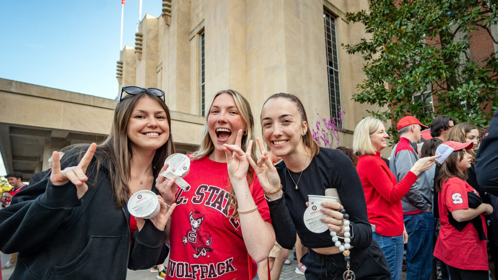 Students celebrate an athletics win during March Madness.